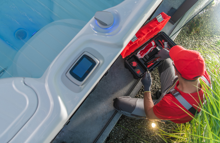 hot tub technician performing hot tub repair service in victoria